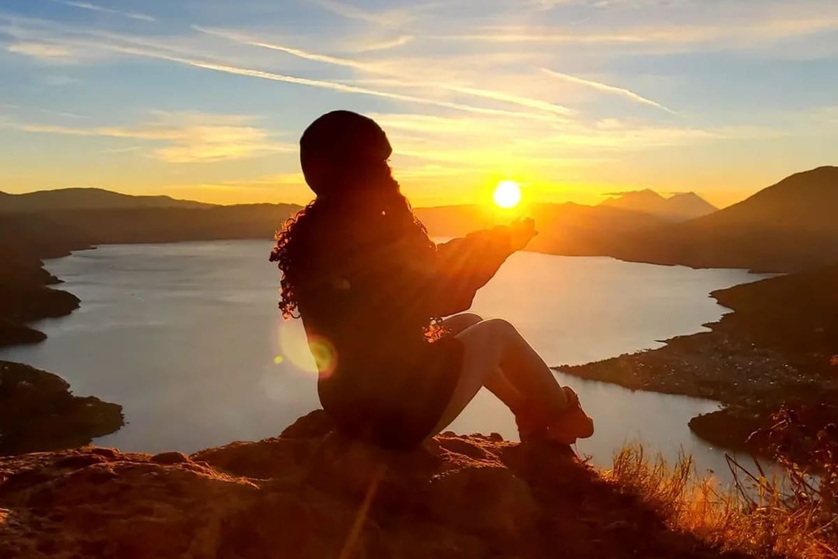 Sunrise view over Lake Atitlán and its volcanoes from the Indian Nose summit